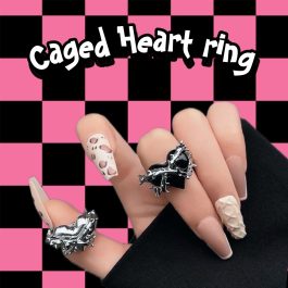Caged heart ring
